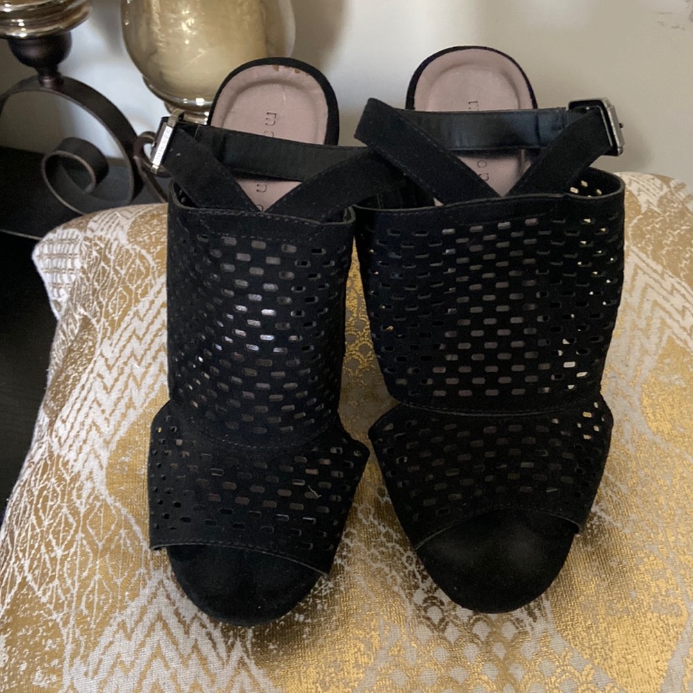 Signs of wear, black wedge heels